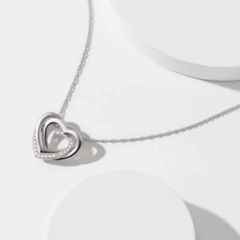 Diamond Accent Heart Pendant In Rhodium Plated Sterling Silver On An 18" Chain