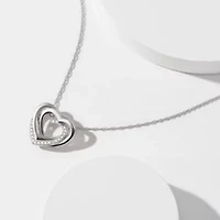 Diamond Accent Heart Pendant In Rhodium Plated Sterling Silver On An 18" Chain