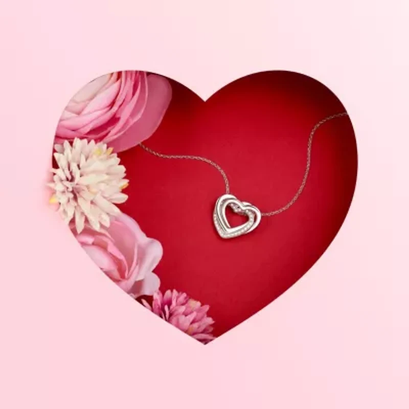 Diamond Accent Heart Pendant In Rhodium Plated Sterling Silver On An 18" Chain