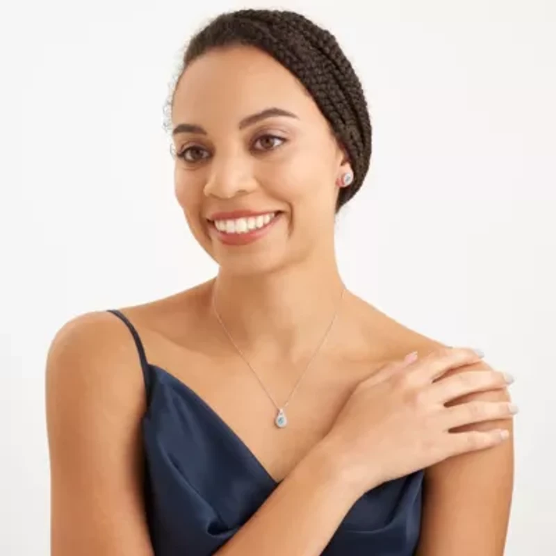 Genuine Blue Topaz and Created White Sapphire Oval Halo Necklace and Earring Set in Sterling Silver