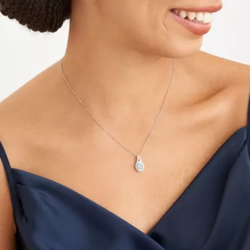Genuine Blue Topaz and Created White Sapphire Oval Halo Necklace and Earring Set in Sterling Silver