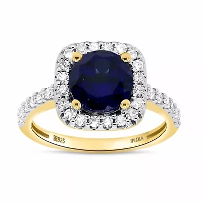 Lab Created 8.00 MM Round Blue Sapphire and 3/8CTTW Grown Diamond Ring.