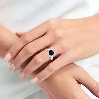 Lab Created 8.00 MM Round Blue Sapphire and 3/8CTTW Grown Diamond Ring.