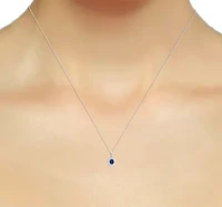 Lab Created 8X6 MM Oval Created Ruby and 1/2CTTW Lab Grown Diamond Pendant W/Chain.