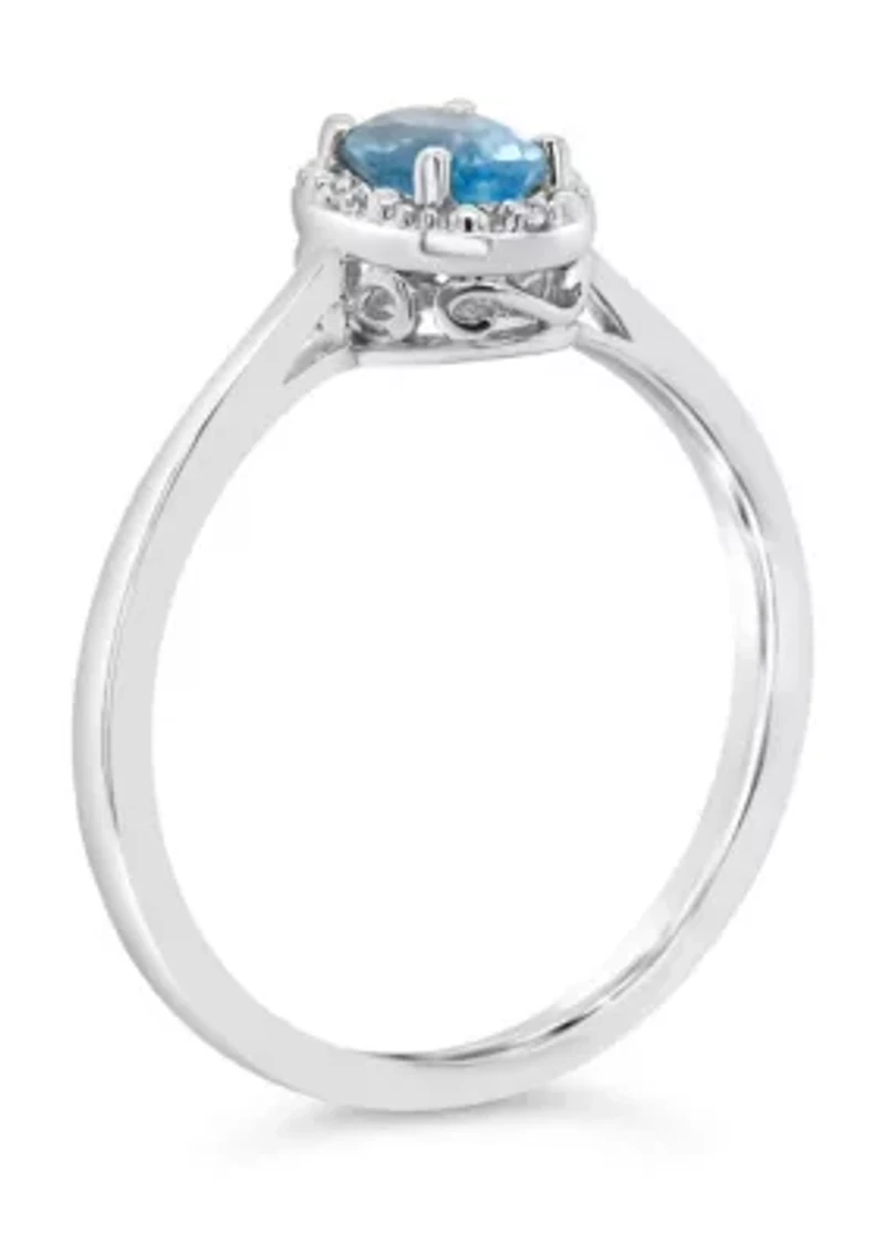 Sterling Silver 6x4mm Oval Blue Topaz Diamond Accent Halo Ring