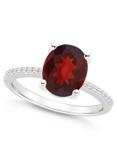 Sterling Silver 10x8mm Oval Garnet 1/10 CTTW Diamond Ring