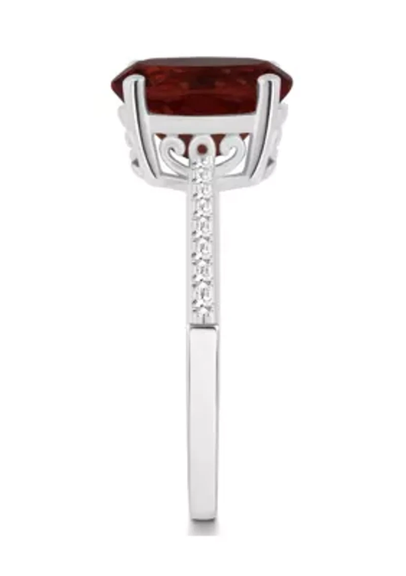 Sterling Silver 10x8mm Oval Garnet 1/10 CTTW Diamond Ring
