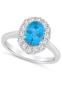 Sterling Silver 8x6mm Oval Blue Topaz And White Halo Ring