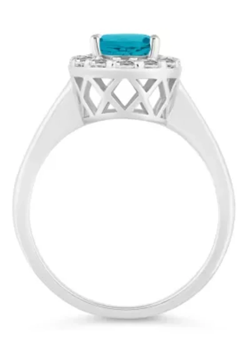 Sterling Silver 8x6mm Oval Blue Topaz And White Halo Ring