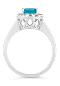 Sterling Silver 8x6mm Oval Blue Topaz And White Halo Ring