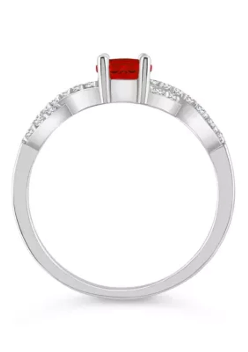 Sterling Silver 7x5mm Oval Garnet and White Topaz Accent Ring