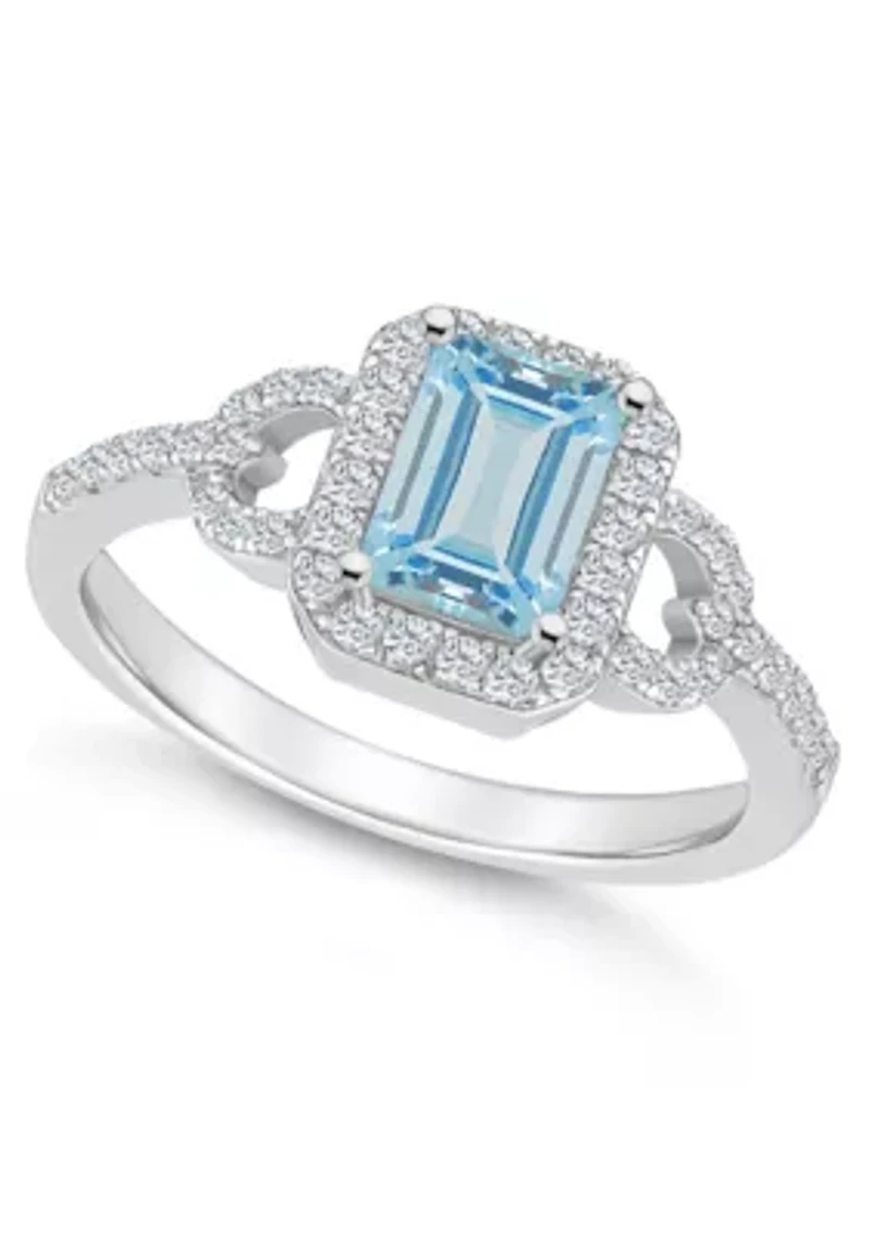Sterling Silver 7x5mm Emerald Cut Sky Blue Topaz and White Accent Ring