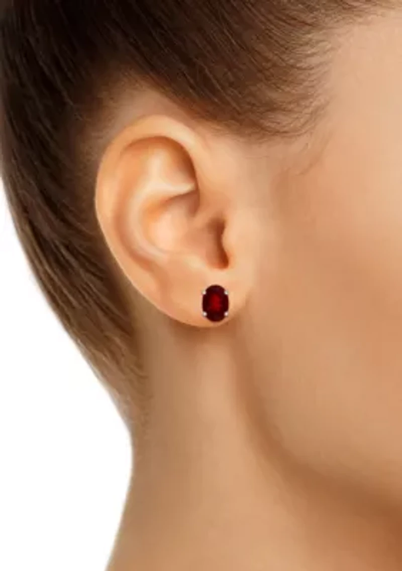 14K Gold 7x5mm Oval Garnet Stud Earrings