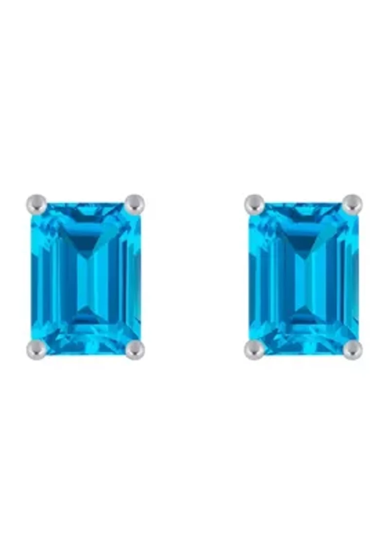 14K Gold 7x5mm Emerald Cut Blue Topaz Stud Earrings