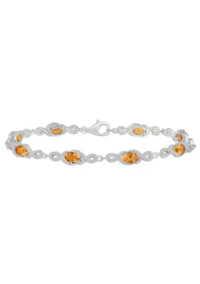 Sterling Silver 6x4mm Oval Citrine and White Topaz Accent Bracelet