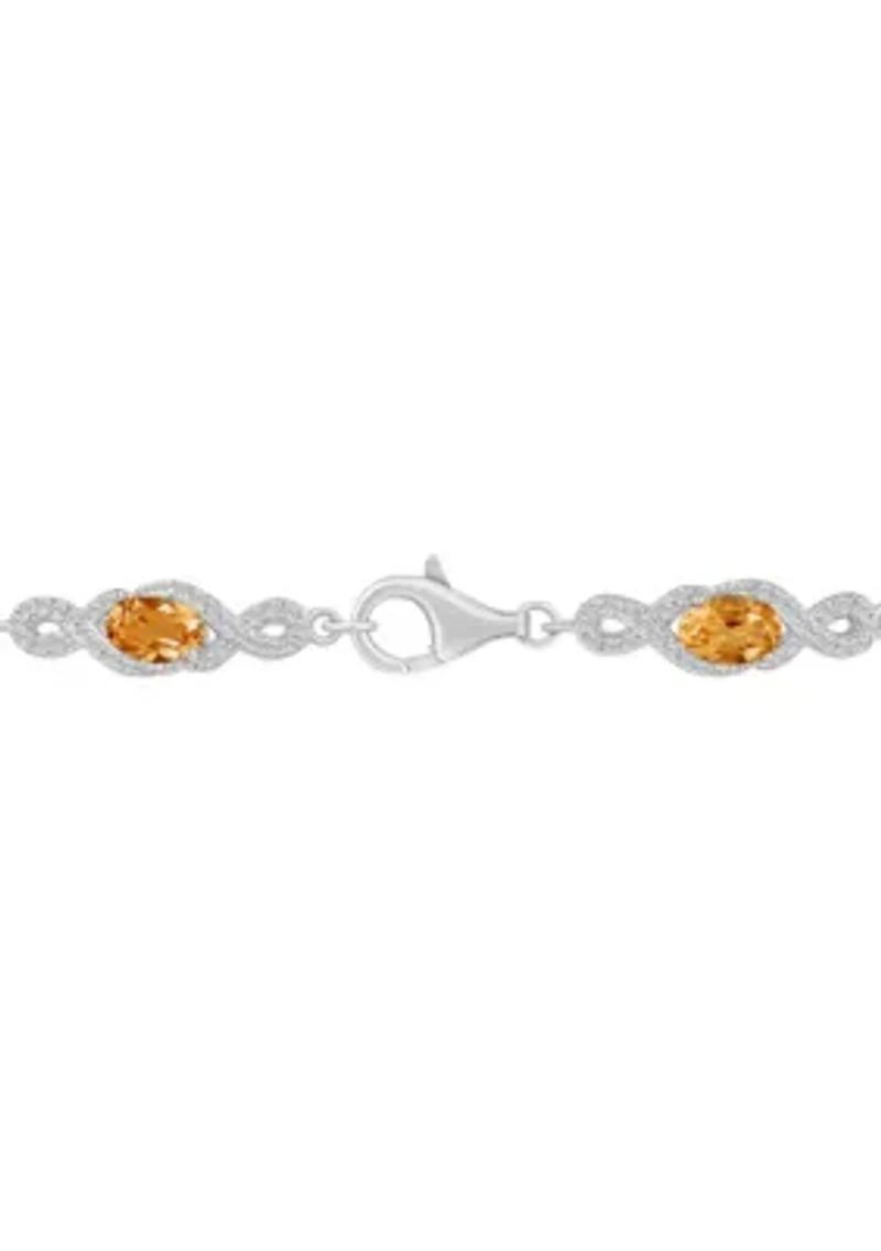 Sterling Silver 6x4mm Oval Citrine and White Topaz Accent Bracelet