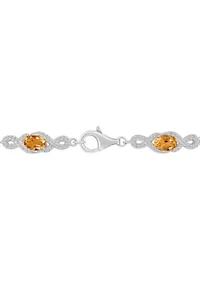 Sterling Silver 6x4mm Oval Citrine and White Topaz Accent Bracelet