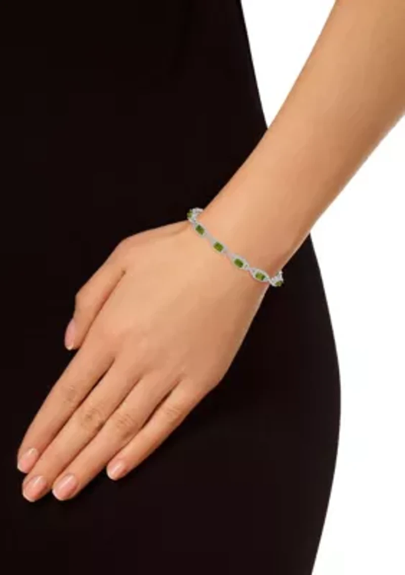 Sterling Silver 6x4mm Emerald Cut Peridot and White Topaz Accent Bracelet
