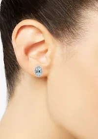 Sterling Silver 6x4mm Oval Aquamarine Diamond Accent Halo Stud Earrings