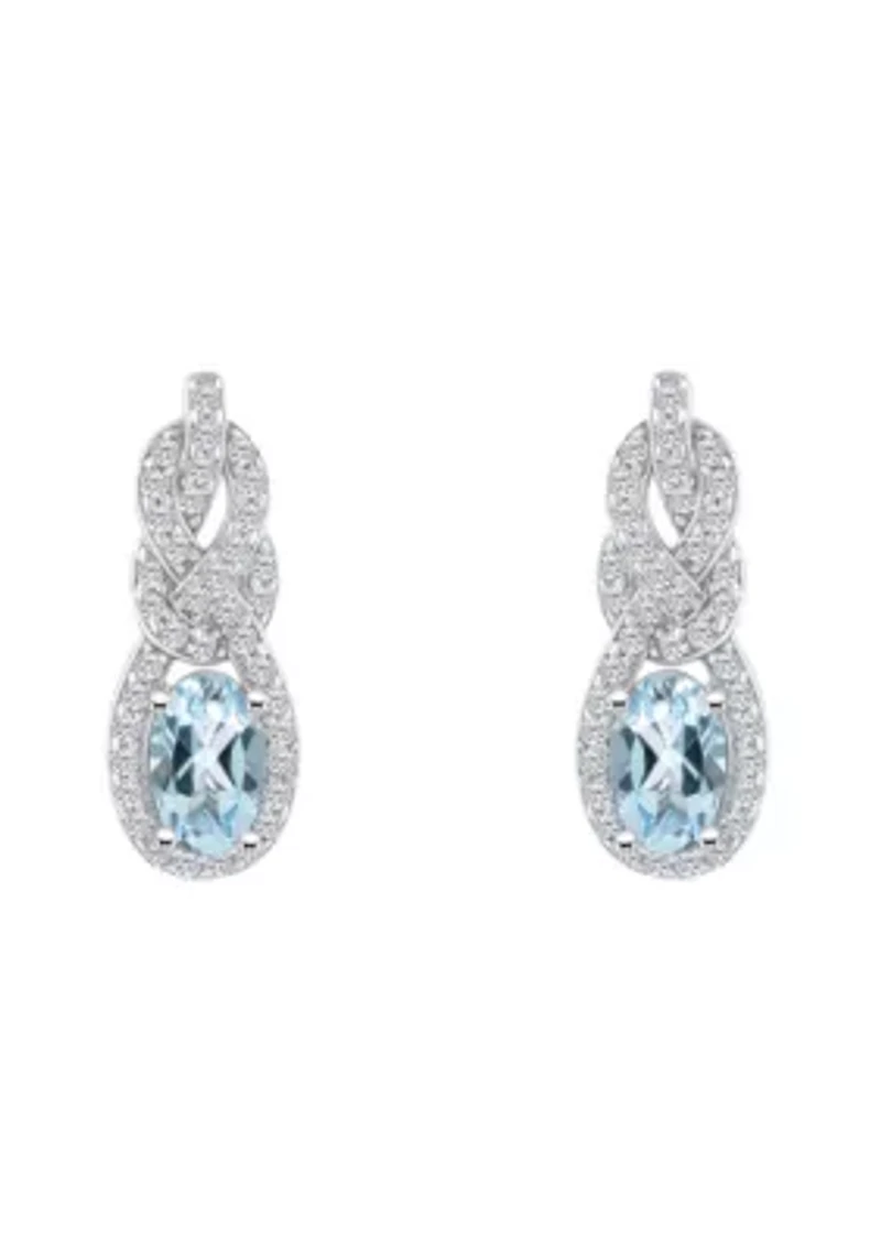 Sterling Silver 6x4mm Oval Sky Blue Topaz and White Topaz Accent Earrings