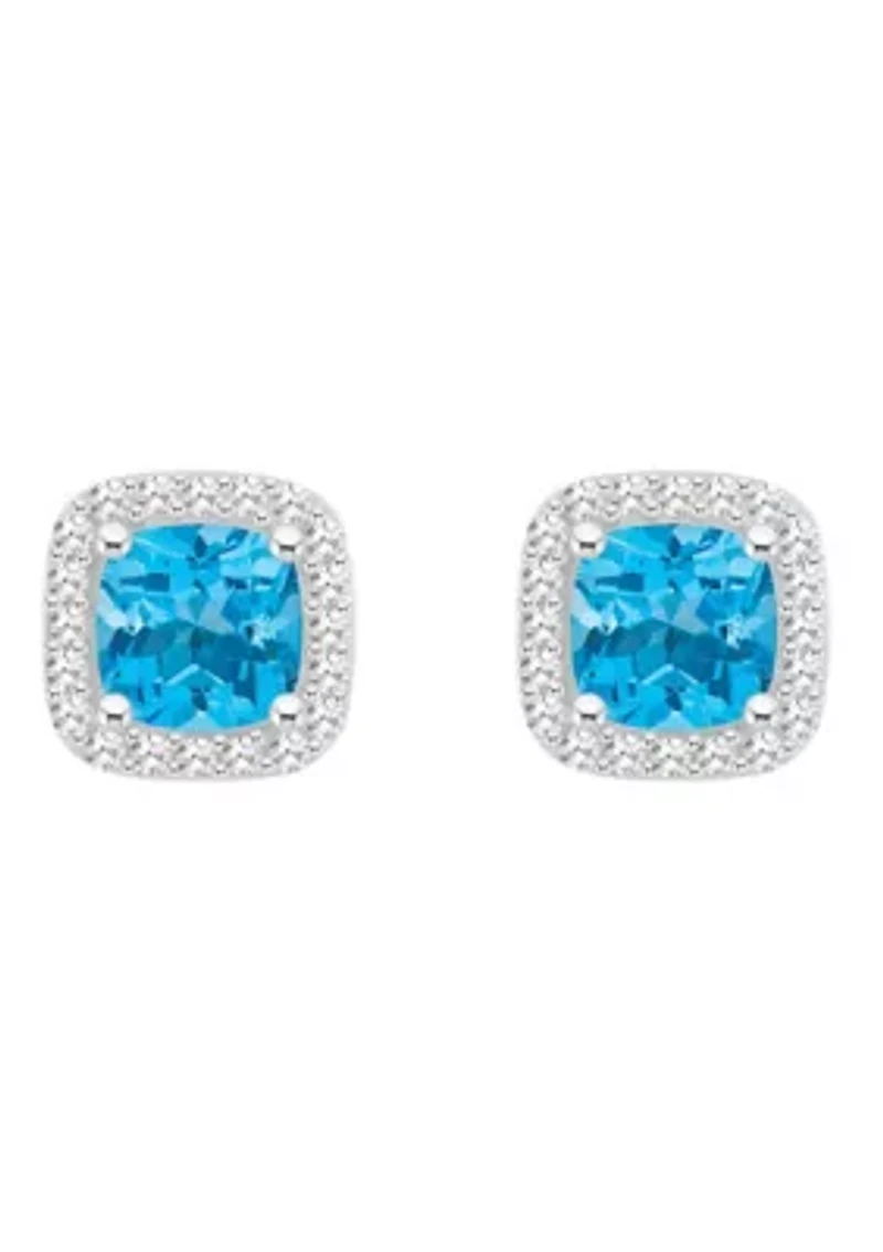 Sterling Silver 5mm Cushion Blue Topaz 1/5 CTTW Diamond Halo Stud Earrings