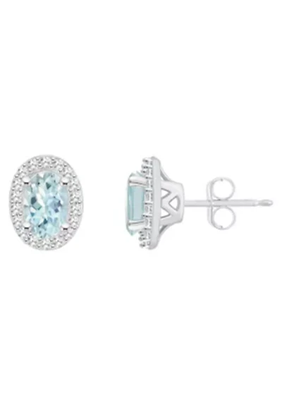 Sterling Silver 6x4mm Oval Aquamarine 1/5 CTTW Diamond Halo Stud Earrings