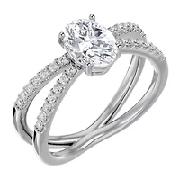 Lab Created /2 ct. t.w. Oval Shape Moissanite and Halo Diamond Ring Sterling Silver