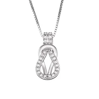 0.12CTTW Diamond Love Knot Pendant Rhodium Plated Sterling Silver