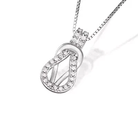 0.12CTTW Diamond Love Knot Pendant Rhodium Plated Sterling Silver