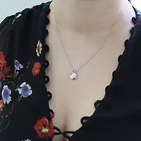 1/20 ct. t.w. Natural Diamond Floating Heart Pendant set in 925 Sterling Silver with 18" Cable Chain