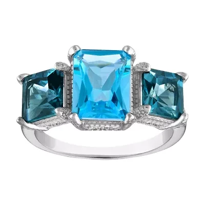 Sterling Silver Blue Topaz And Created White Sapphire Ring