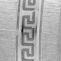 stainless steel huggie with greek key and stainless steel accent