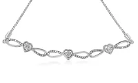 Silver 1/10 Cttw Diamond Triple Heart-in-Infinity Bolo Style Adjustable Bracelet