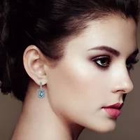 .925 Sterling Silver 5mm Blue Topaz and Diamond Dangle Earrings