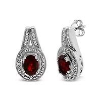 Silver Diamond Accent and 8x6mm Red Oval Garnet Stud Earrings