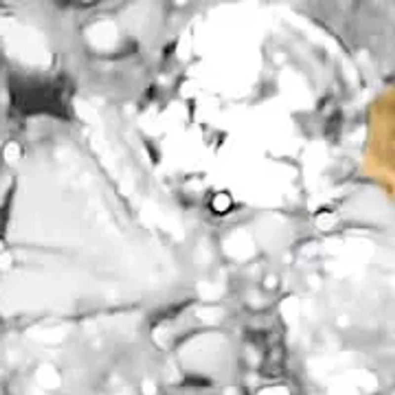 10k Yellow and White Gold 1/2 Cttw Diamond Bypass Triple Leaf Ring