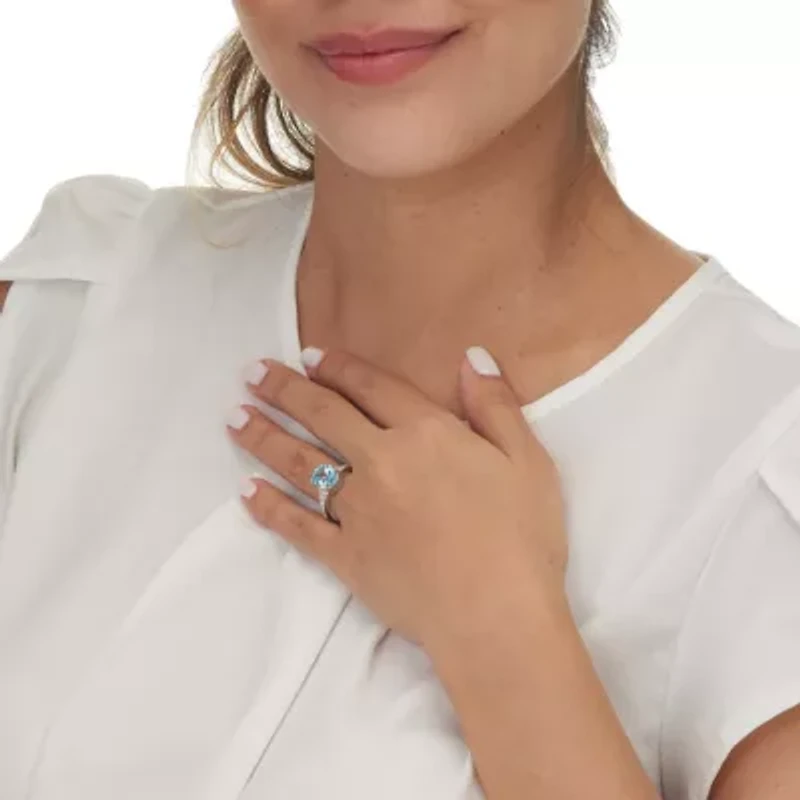 4.70 TCW Oval Cut Genuine Blue Topaz and Cubic Zirconia Sterling Silver Ring