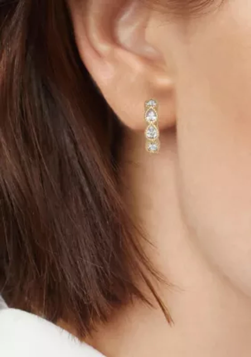 Gold Tone 14 Millimeter Cubic Zirconia Huggie Earrings