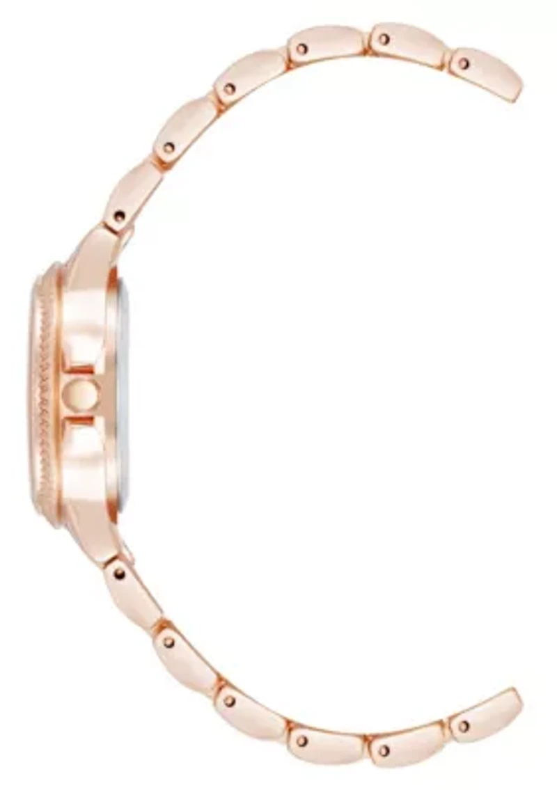 Steve Madden Women's Everyday Hot Pink and Rose Gold-Tone Alloy Metal Bracelet Watch, 30mm