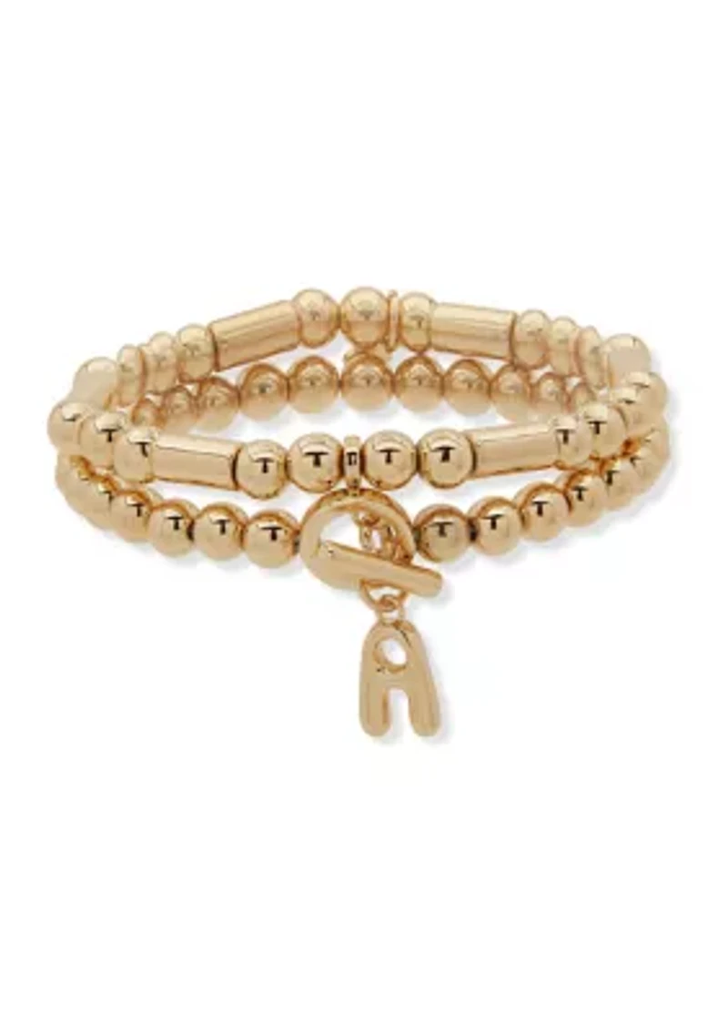 Gold Tone Puffy Initial Stretch Bracelet Set