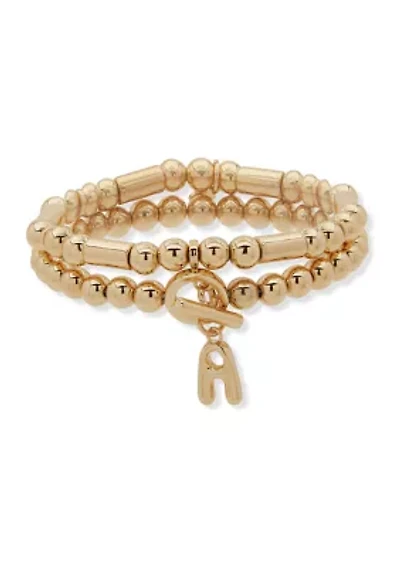Gold Tone Puffy Initial Stretch Bracelet Set