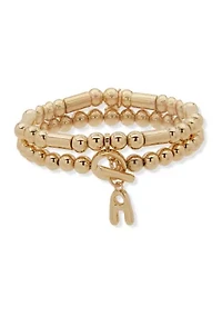 Gold Tone Puffy Initial Stretch Bracelet Set