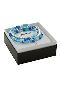 Blue Beaded Multi Row Silver Cross Pendant Stretch Bracelet
