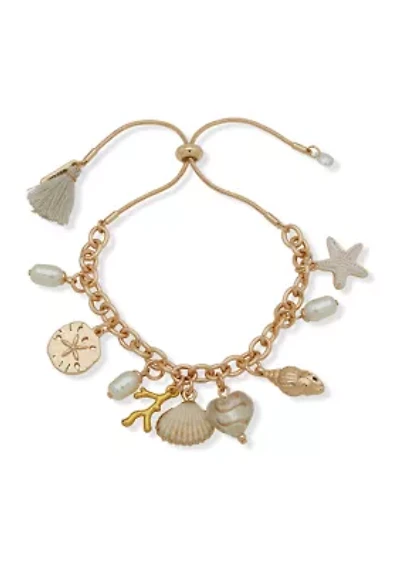 Gold Tone White Sealife Charm Slider Bracelet
