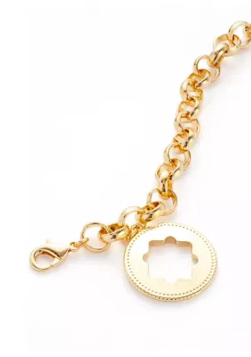 Gold Tone Quatrefoil Charm Line Bracelet