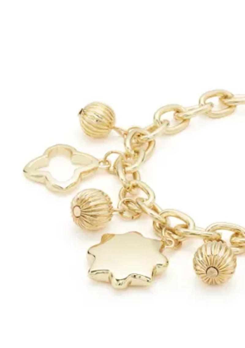 Gold Tone Shakey Quatrefoil Charm Line Bracelet