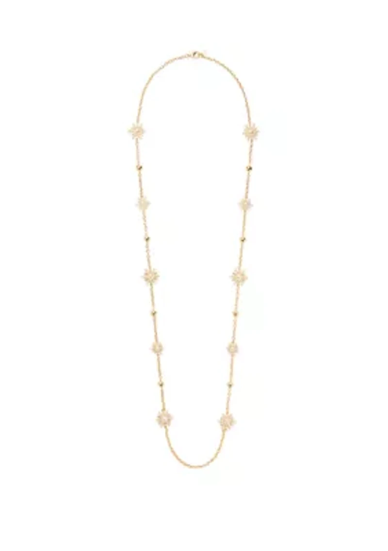Gold Tone Starburst Long Strand Necklace