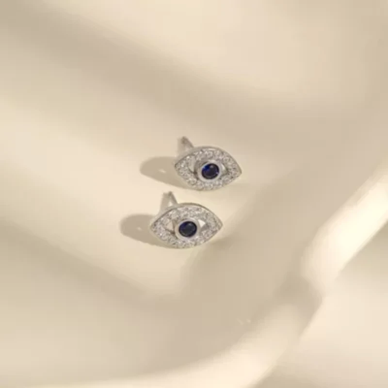 Lab Created Platinum Plated Sterling Silver Synthetic Sapphire and Clear Cubic Zirconia Dainty Evil Eye Stud Earrings