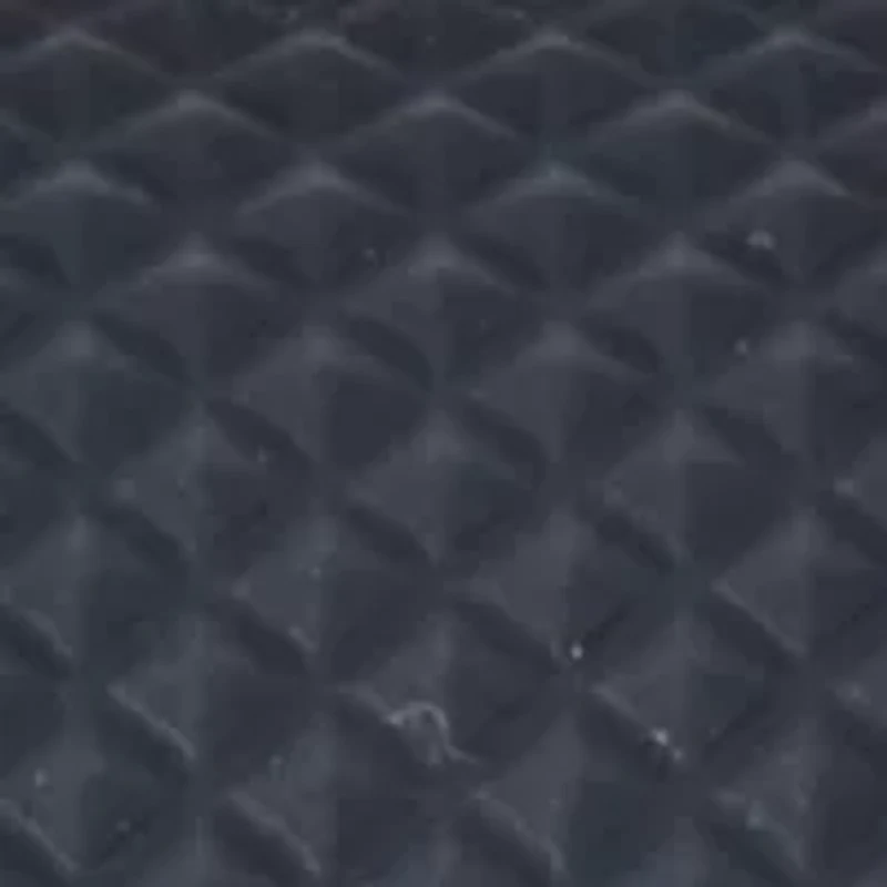 IZOD Black Textured Silicone Strap Watch with Aqua Accent Bezel