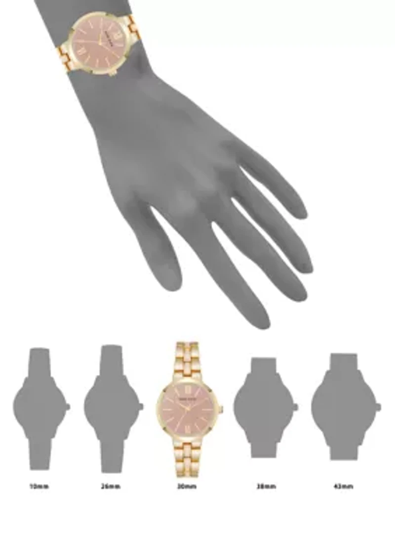 Pink Enamel and Gold Tone Alloy Metal Bracelet Watch